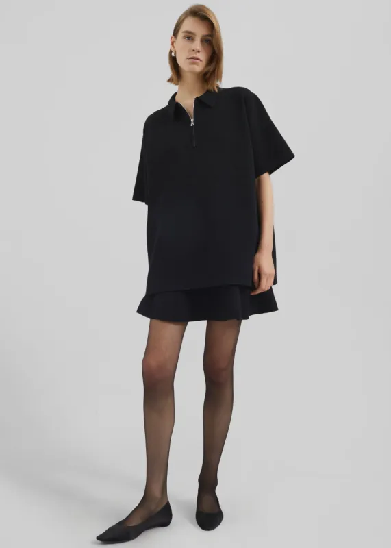 Riya Zip-Up Polo - Black sold by Frankie Shop