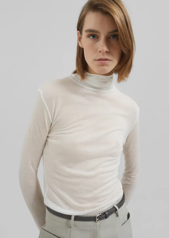 Evren Sheer Turtleneck - White sold by Frankie Shop