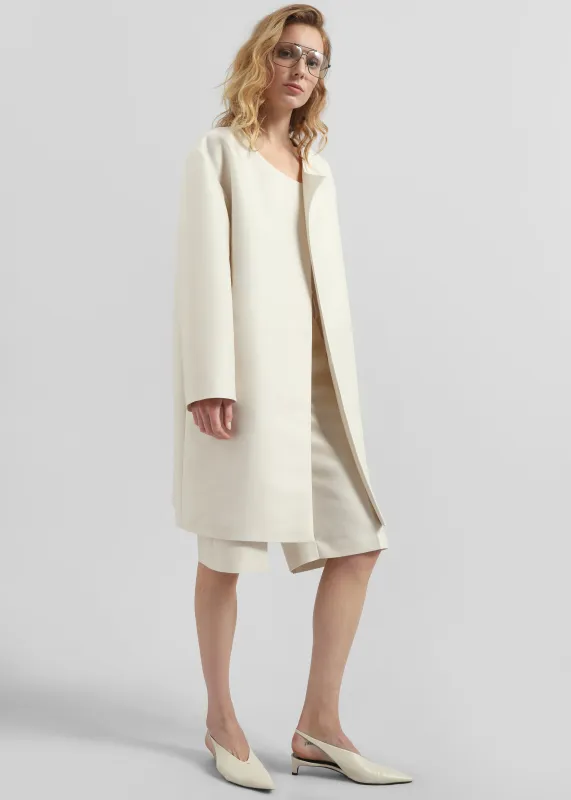Zwolle Sheen Light Overcoat - Cream sold by Frankie Shop