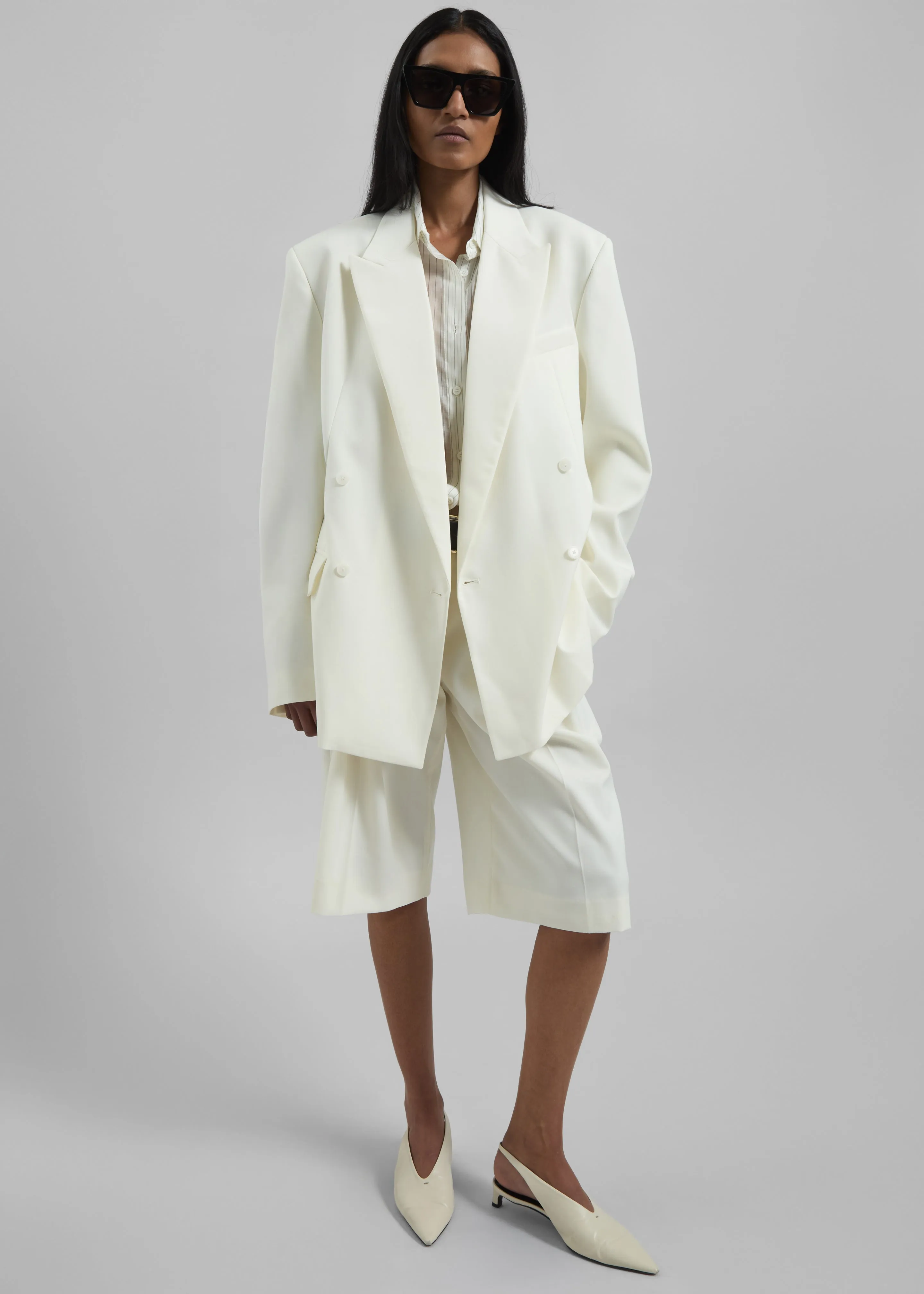 Bilbao Pleated Wool Bermuda Shorts - Off White sold by Frankie Shop