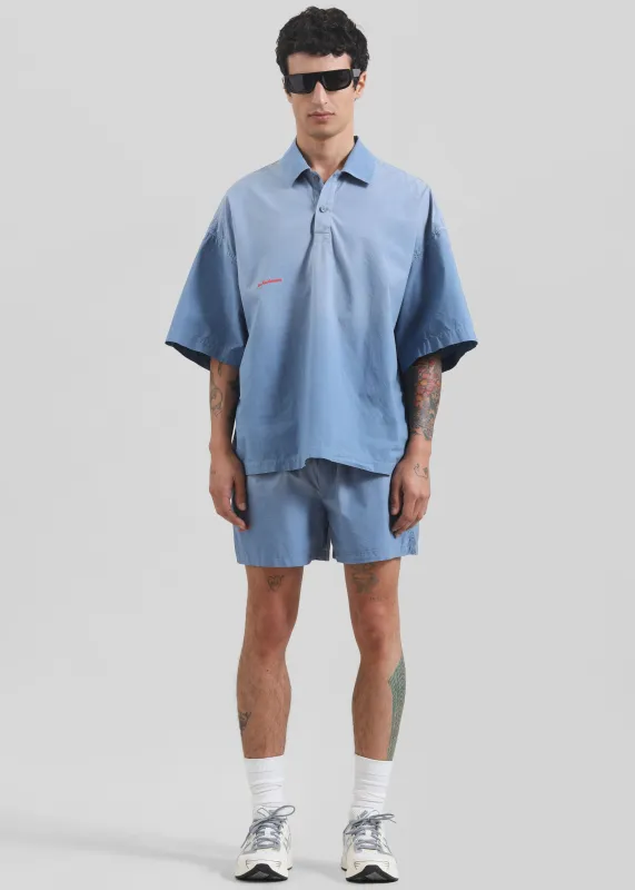 JW Anderson Oversized Logo Polo Shirt - Light Blue sold by Frankie Shop
