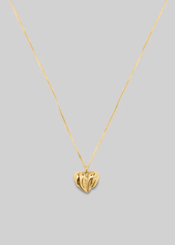 Completedworks Small Heart Locket Necklace - Gold made by Frankie Shop