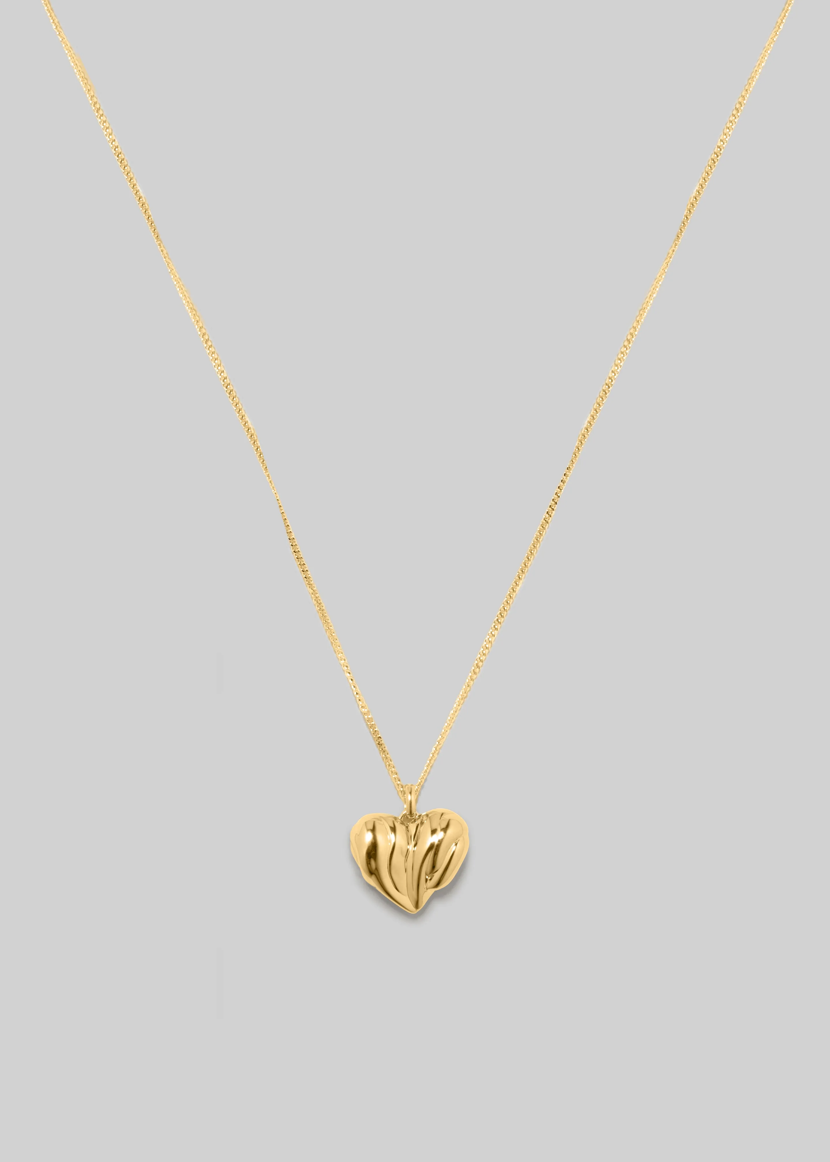 Completedworks Small Heart Locket Necklace - Gold sold by Frankie Shop