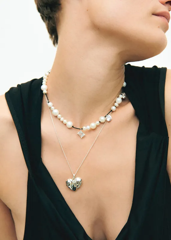 Completedworks Heart Locket Pendant Necklace - Silver made by Frankie Shop