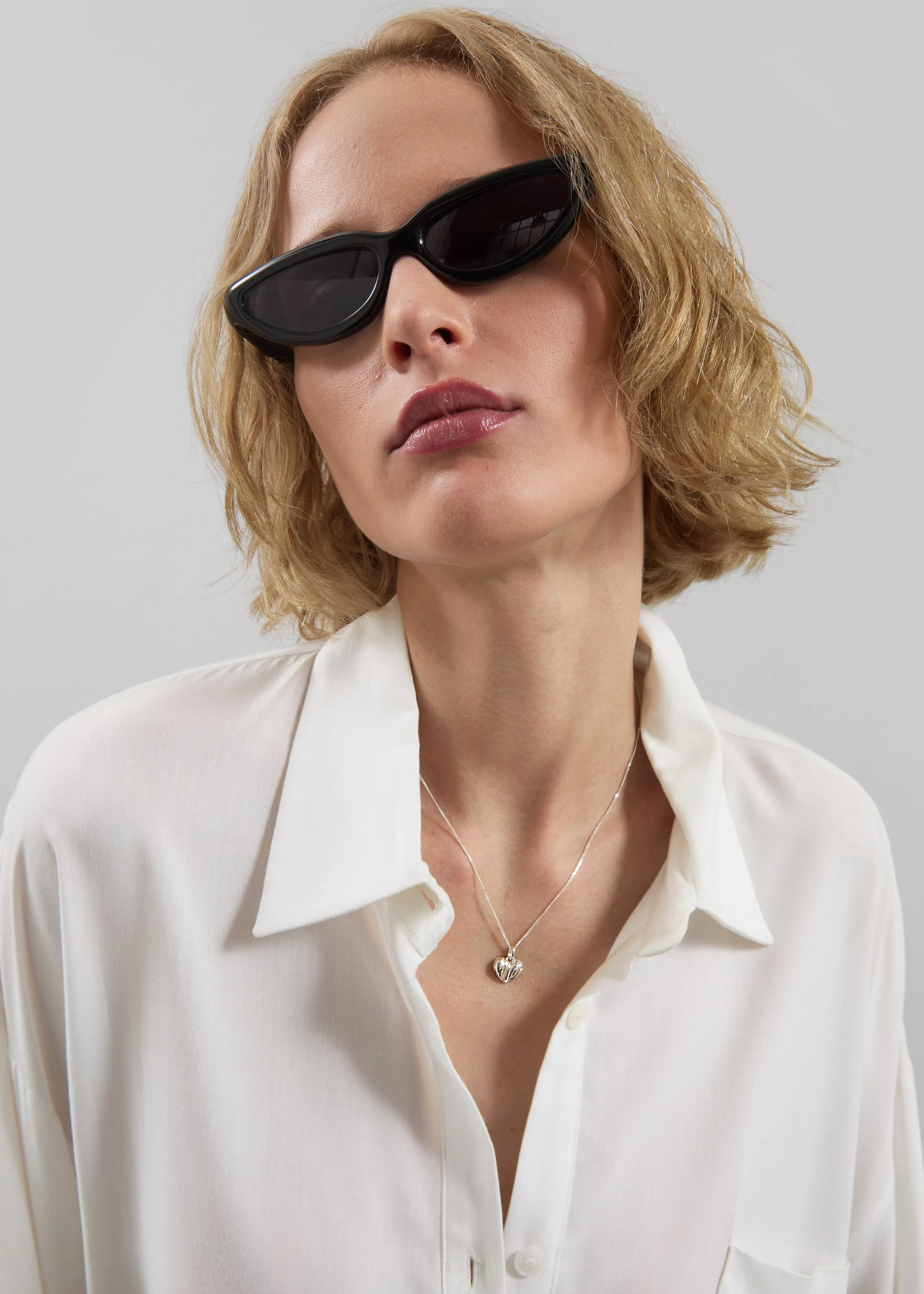 Completedworks Small Heart Locket Necklace - Silver sold by Frankie Shop product image thumbnail 3