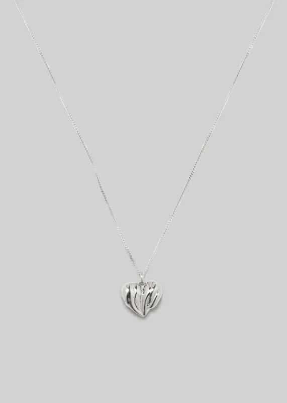Completedworks Small Heart Locket Necklace - Silver sold by Frankie Shop