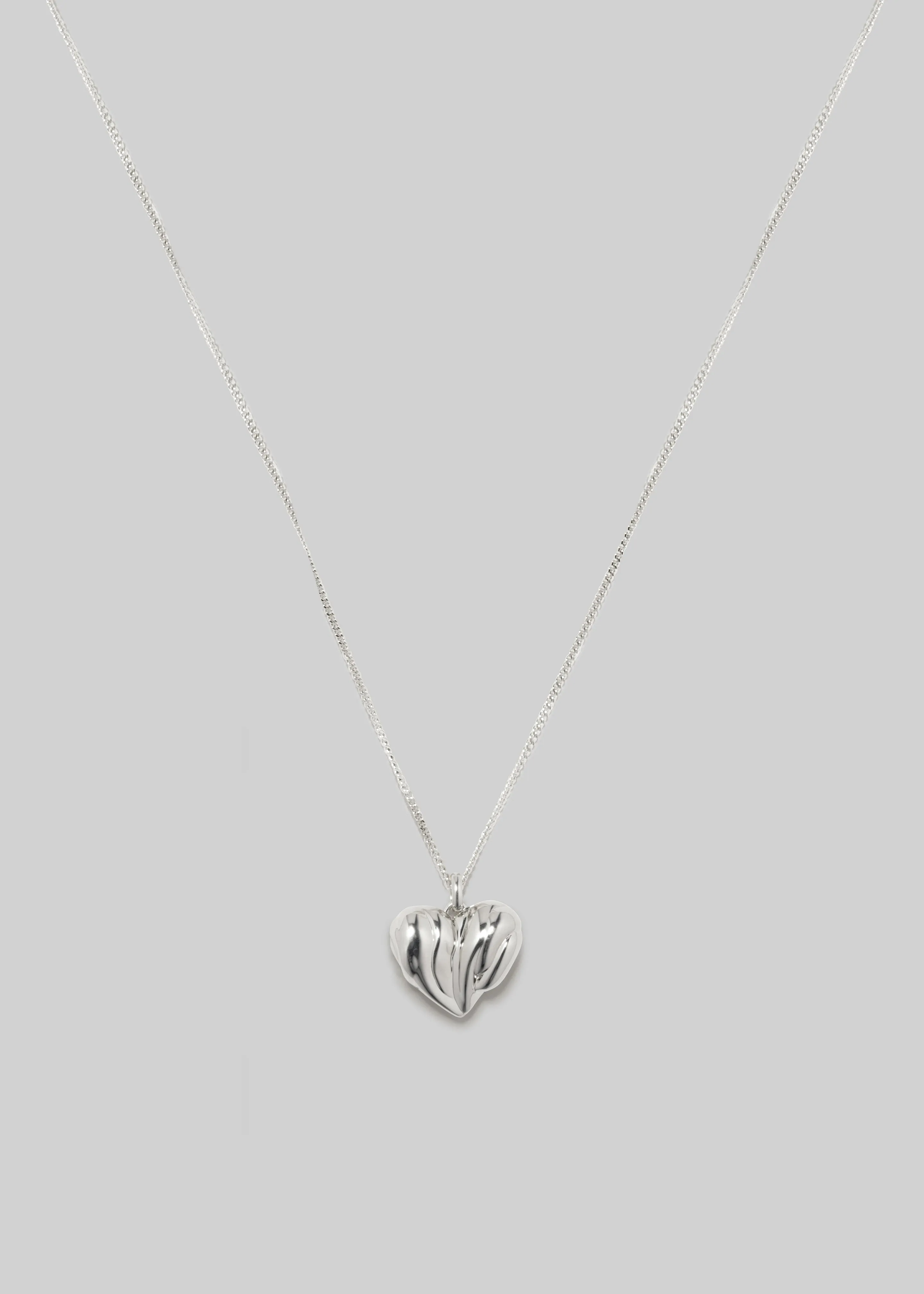 Completedworks Small Heart Locket Necklace - Silver sold by Frankie Shop