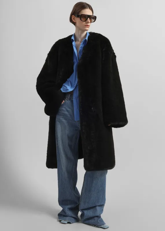 Matera Collarless Faux Fur Coat - Black sold by Frankie Shop