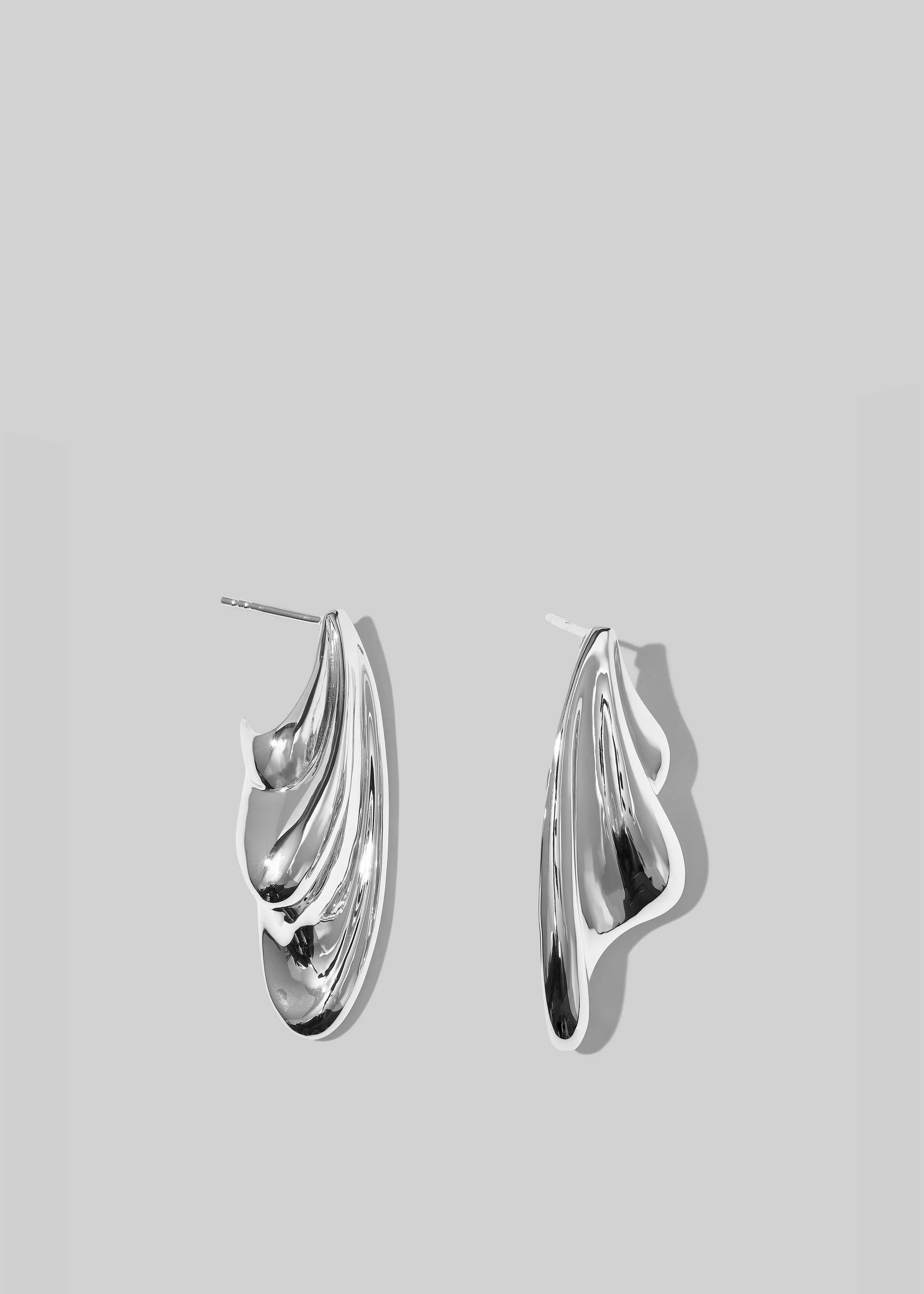 Otiumberg Statement Wave Earrings - Silver sold by Frankie Shop