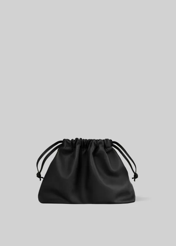 Morgan Faux Leather Small Pouch - Black made by Frankie Shop