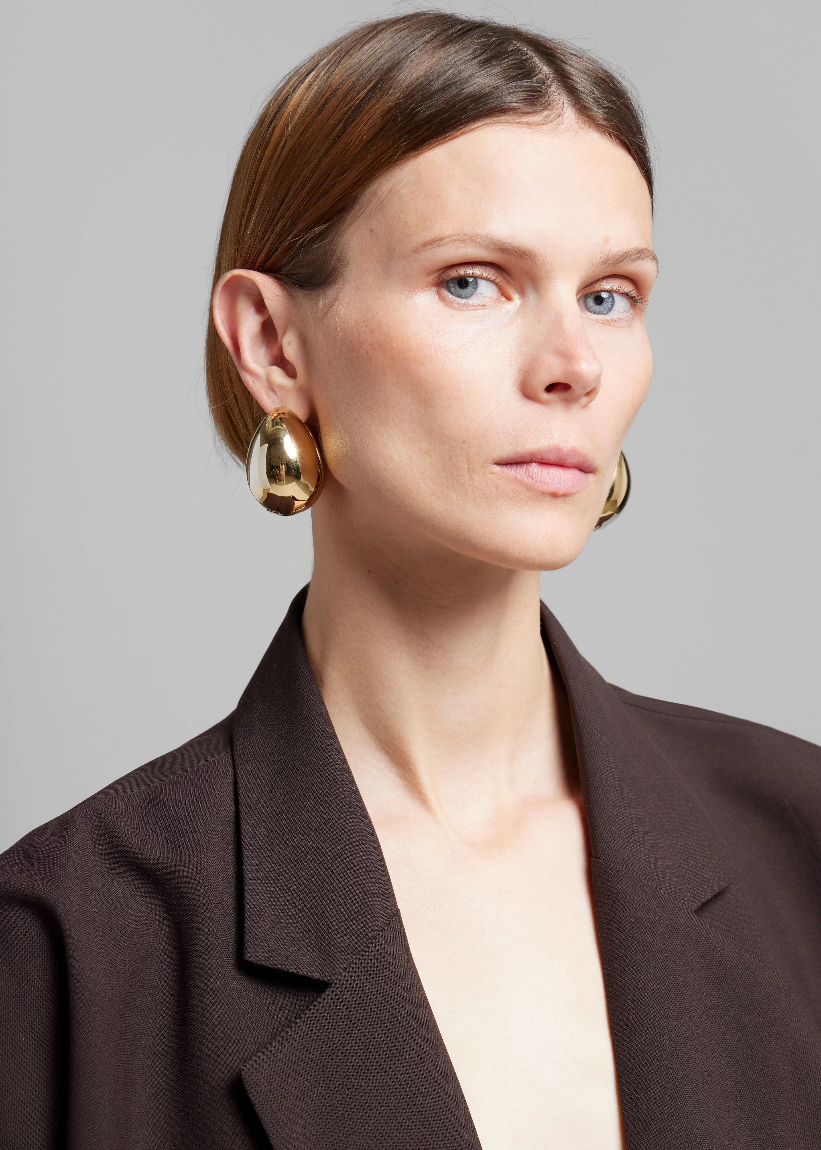 Coperni XL Logo Creole Earrings - Gold sold by Frankie Shop product image thumbnail 3