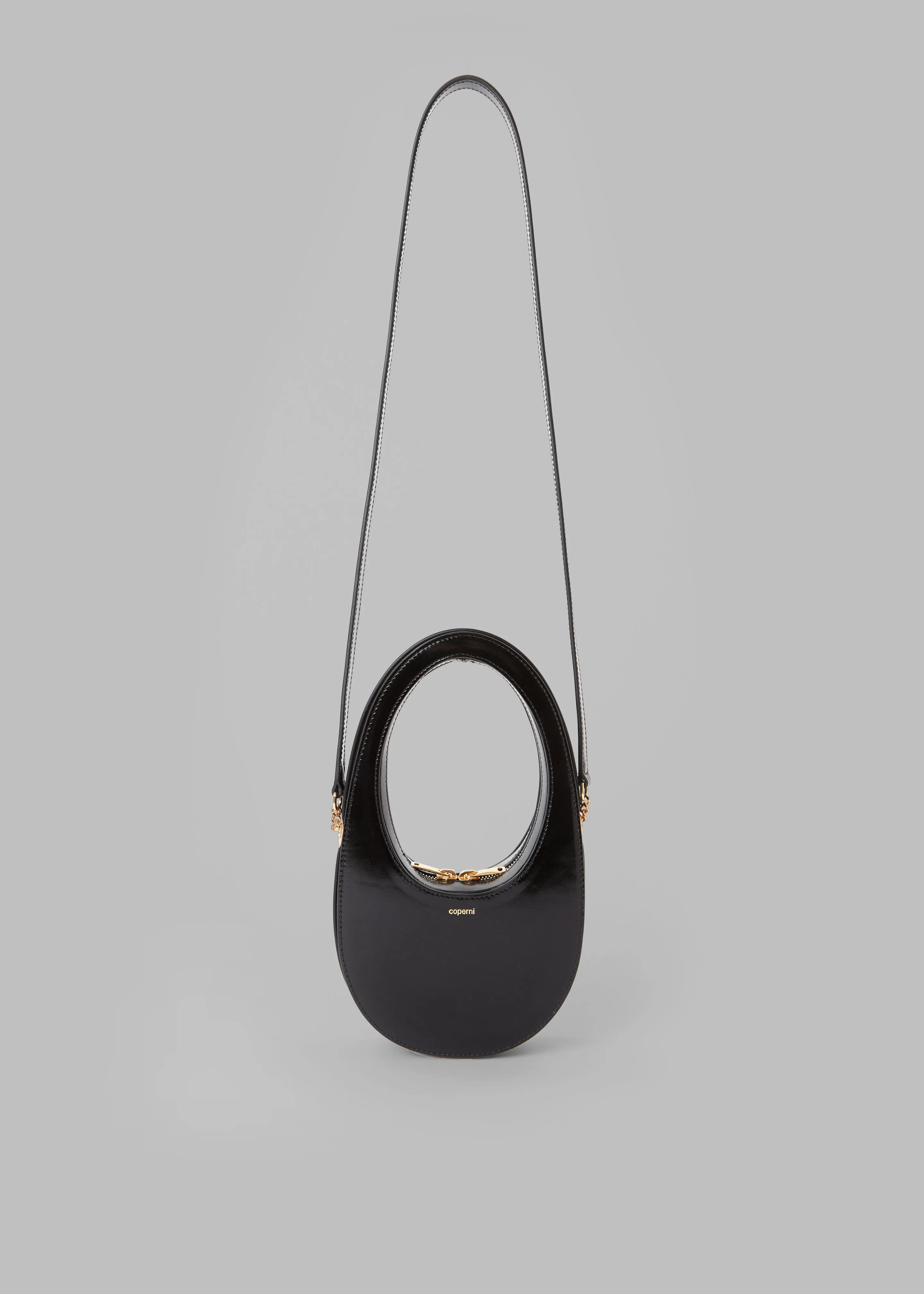 Coperni Crossbody Mini Swipe Bag - Black/Gold sold by Frankie Shop