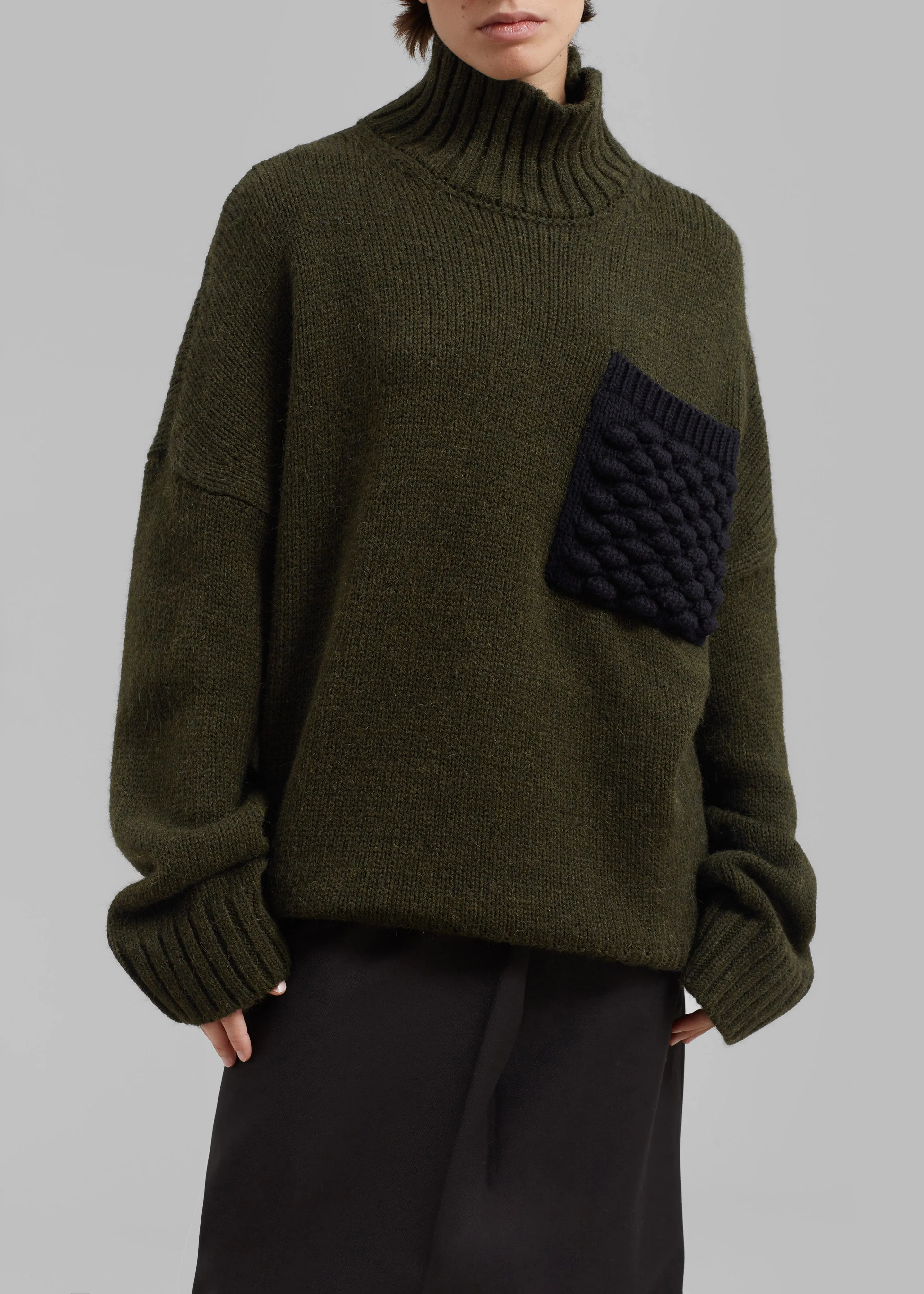 JW Anderson Textured Patch Pocket Turtleneck Jumper - Forest Green sold by Frankie Shop product image thumbnail 3