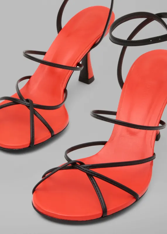 Christopher Esber Blaze Heels - Vermilion/ Black sold by Frankie Shop