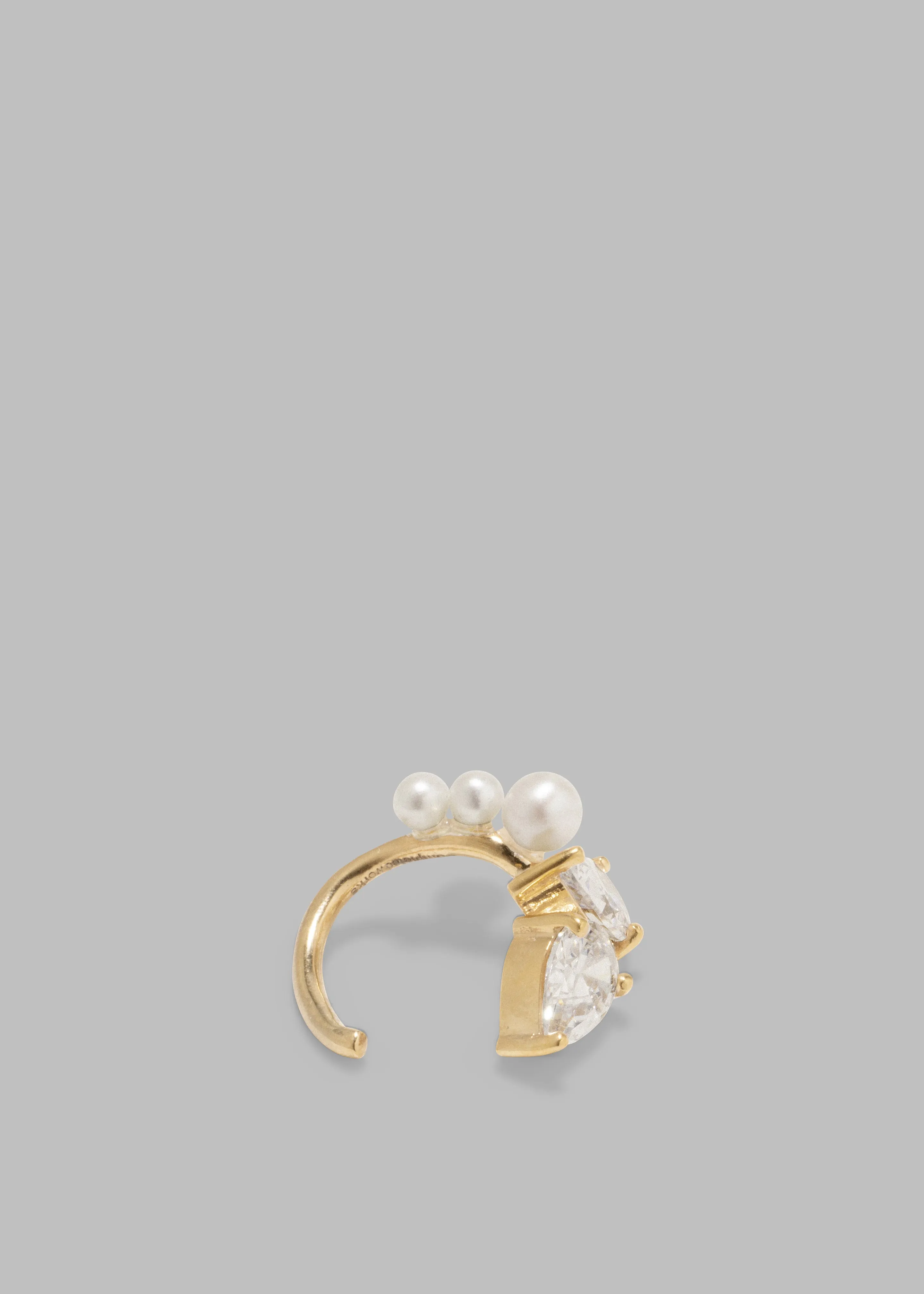 Completedworks Chasing Shadows Ear Cuff - Gold sold by Frankie Shop