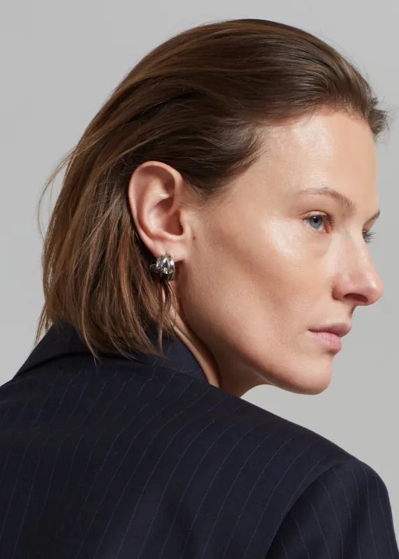 Completedworks The Comeback Kid Earrings - Silver made by Frankie Shop