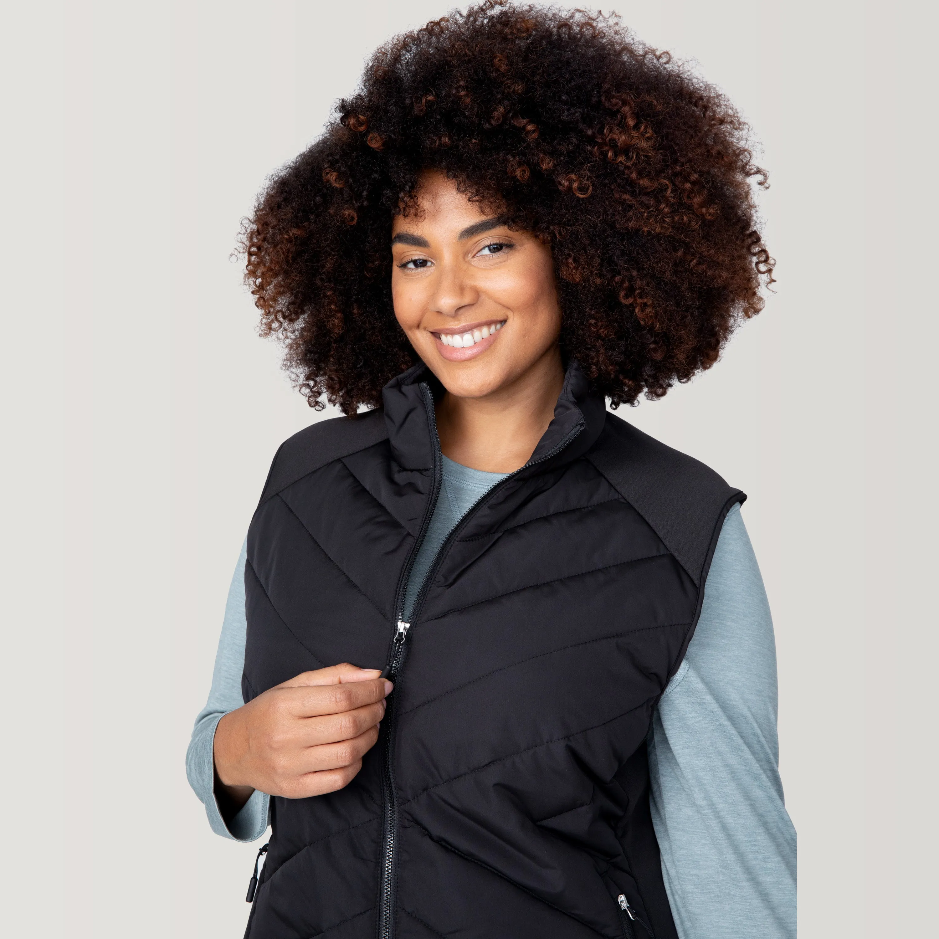 Women's Plus Size Quilted Hybrid Vest sold by Free Country