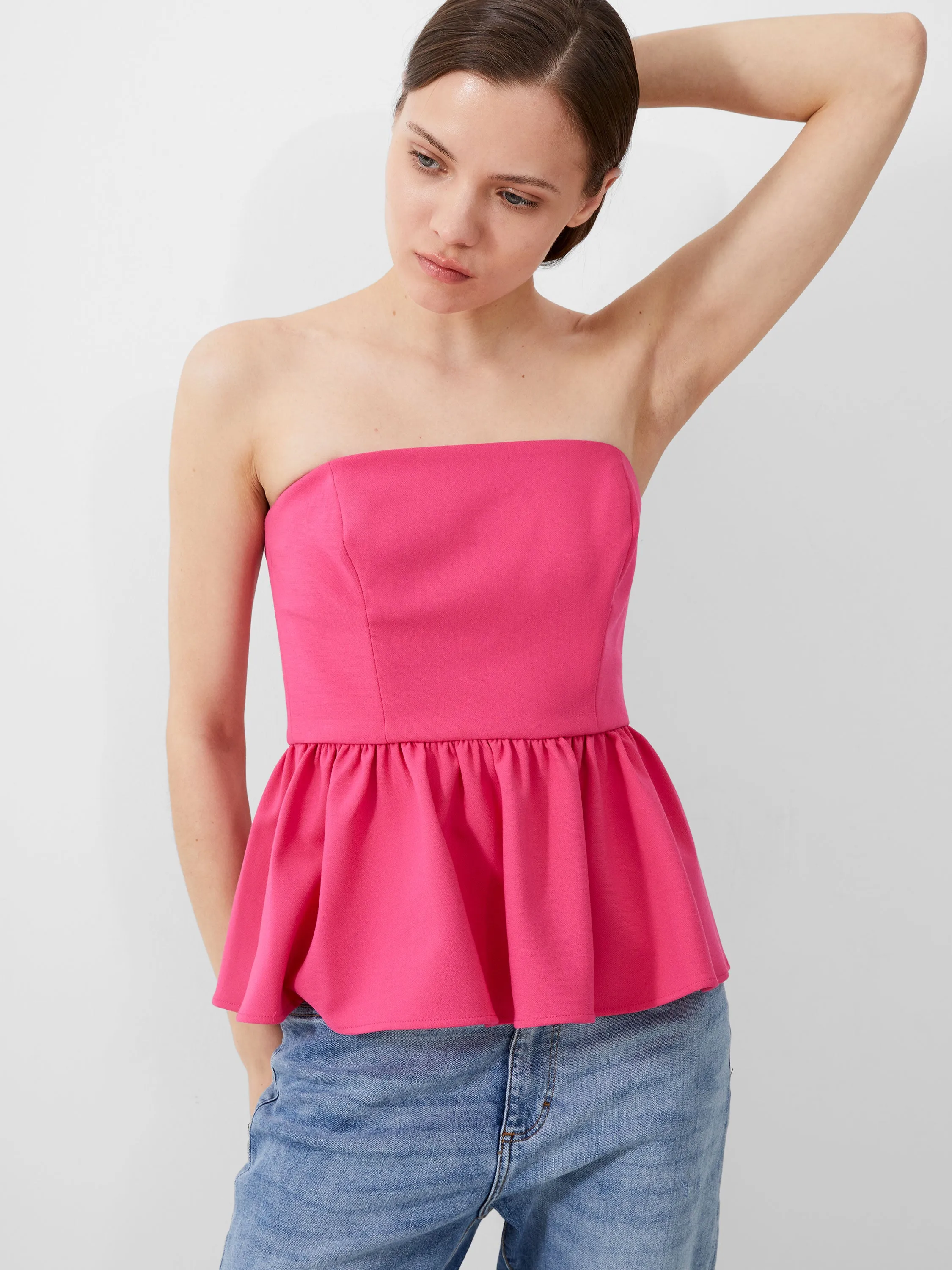 Whisper Strapless Peplum Top sold by French Connection