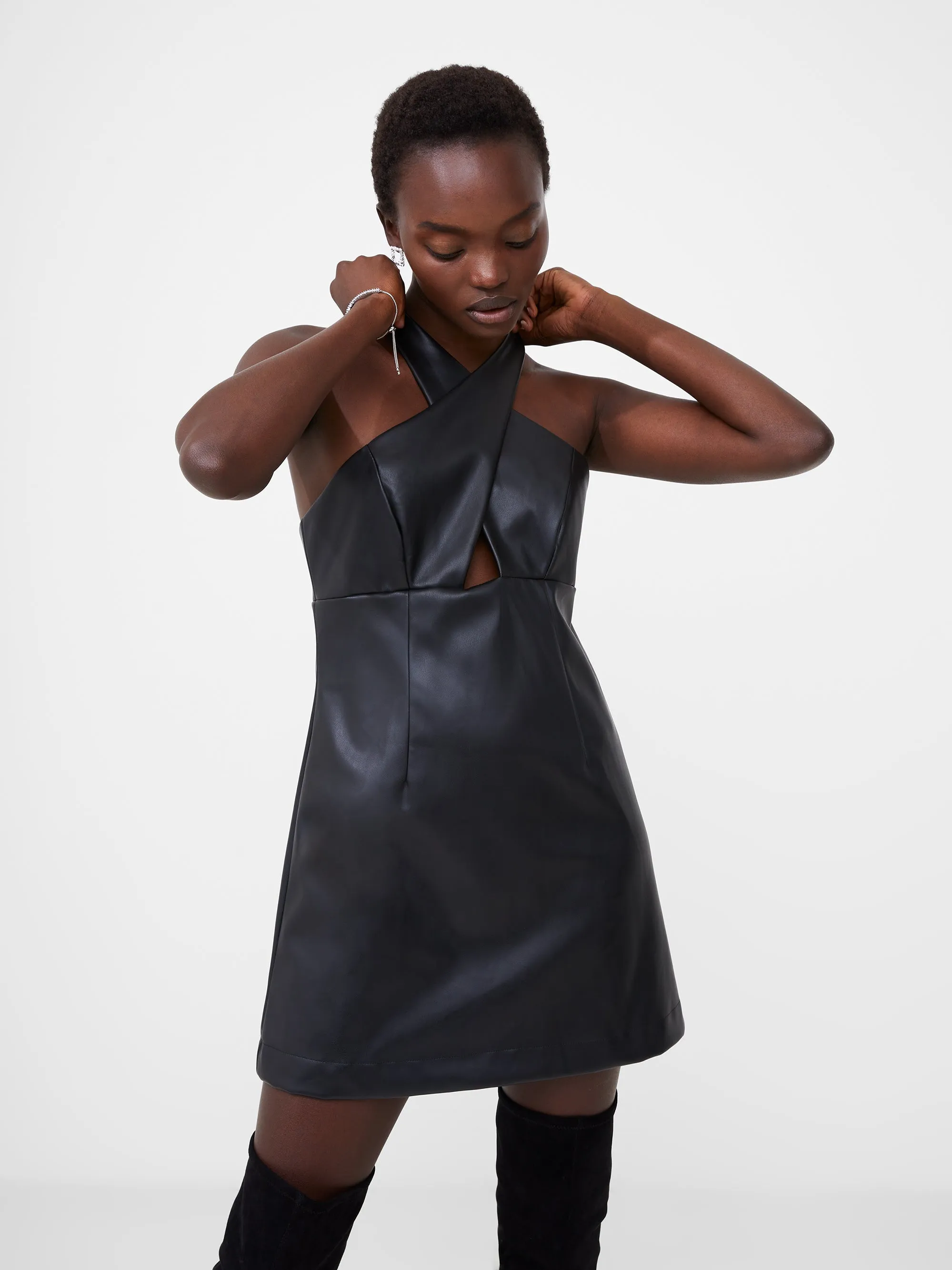 Crolenda Faux Leather Cross Strap Mini Dress sold by French Connection
