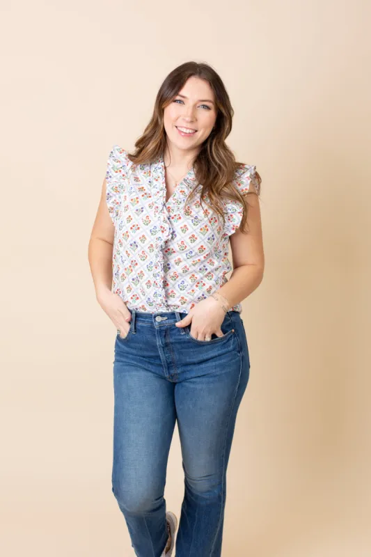 White Diagonal Floral Print Blouse with Ruffle Trim sold by French Cuff