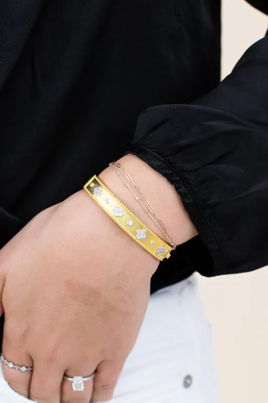 Bangle with Pave Flowers sold by French Cuff