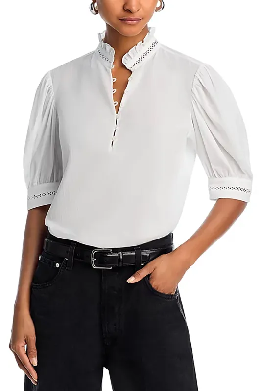 The Ruffle Collar Top sold by French Cuff