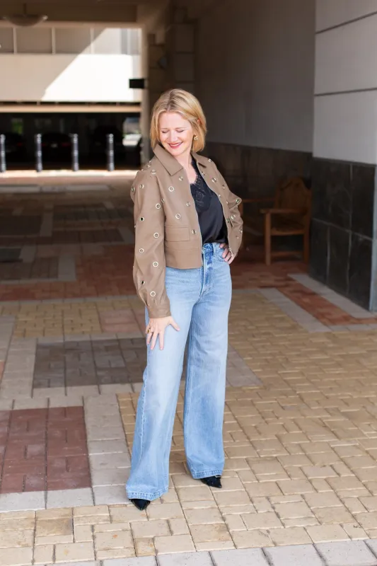 Grommet Faux Leather Jacket sold by French Cuff