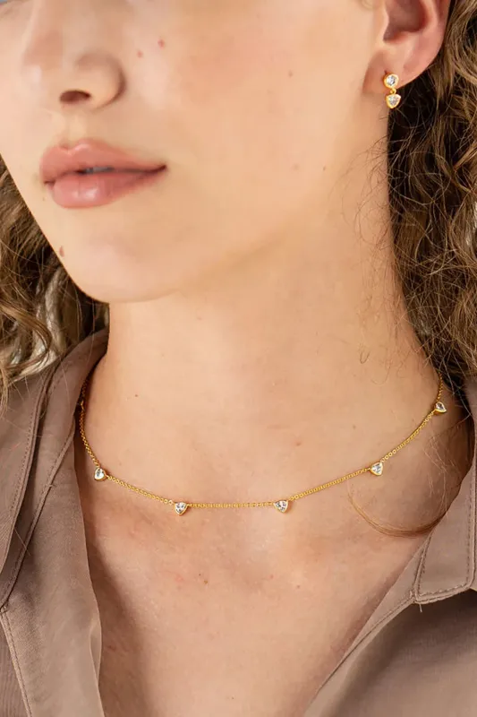 18K Gold Triangle Drop Necklace sold by French Cuff
