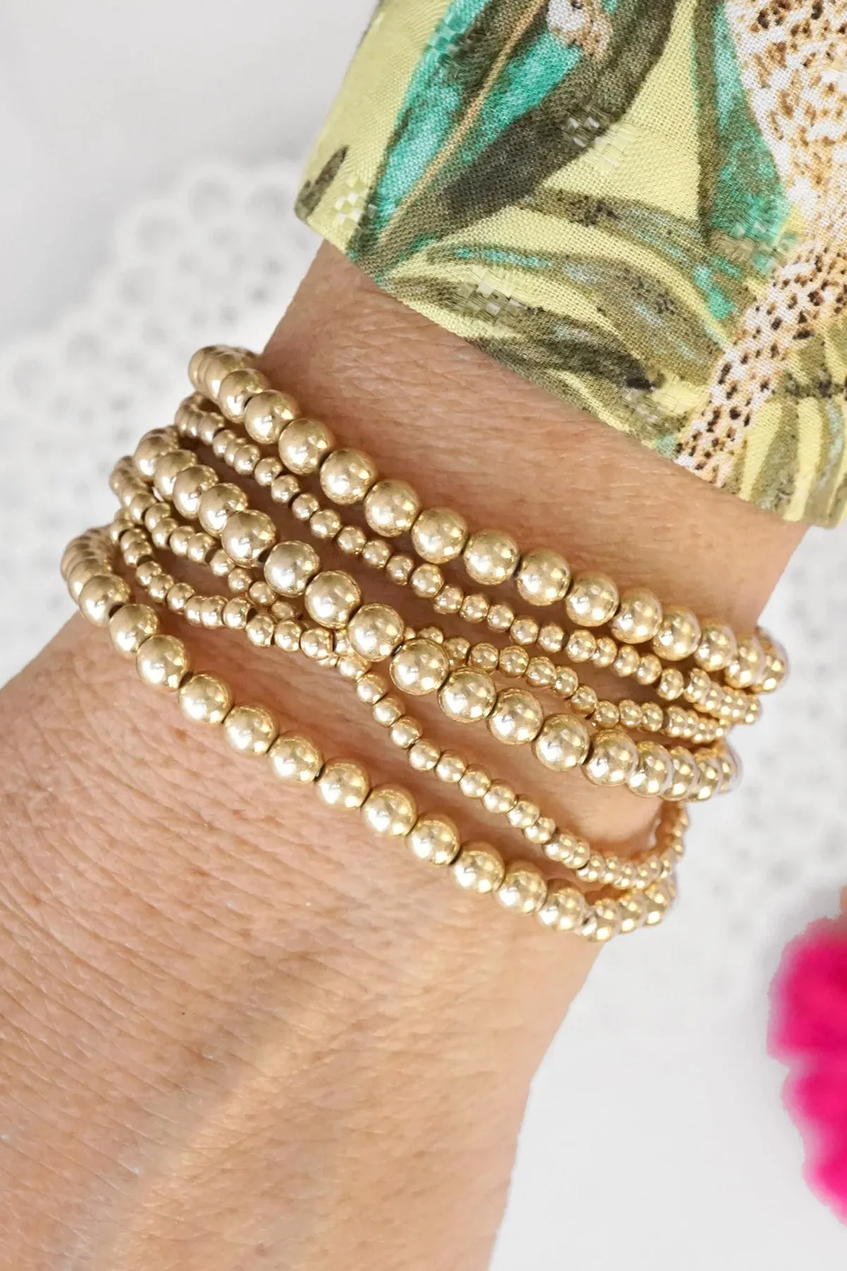 Worn Gold Tone Multi Size Beaded Bracelet Stack of 6 Bracelets sold by French Cuff