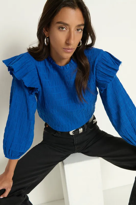 Aria Ruffle Top sold by French Cuff