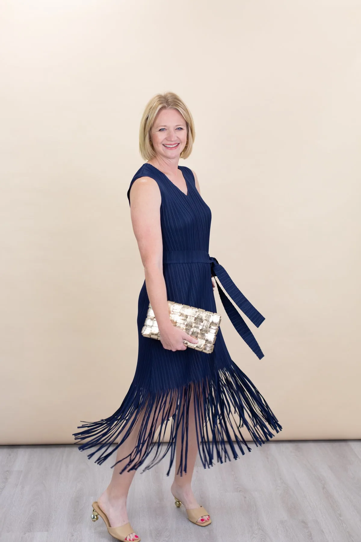 Navy Sleeveless Pleated Midi Dress sold by French Cuff