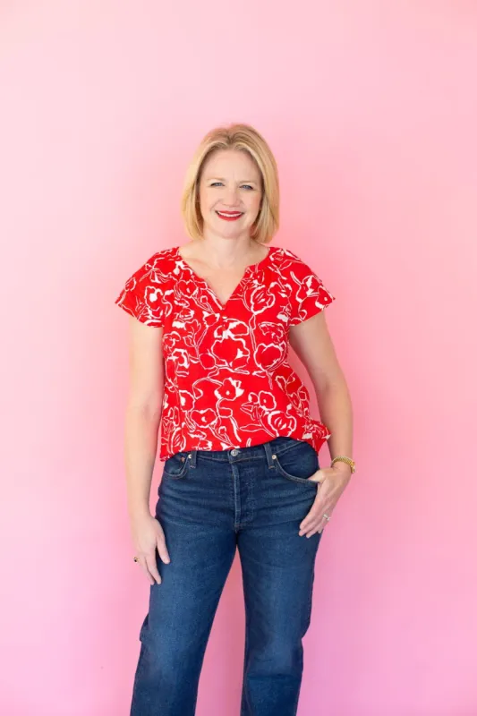 Red Split Neck Printed Top sold by French Cuff