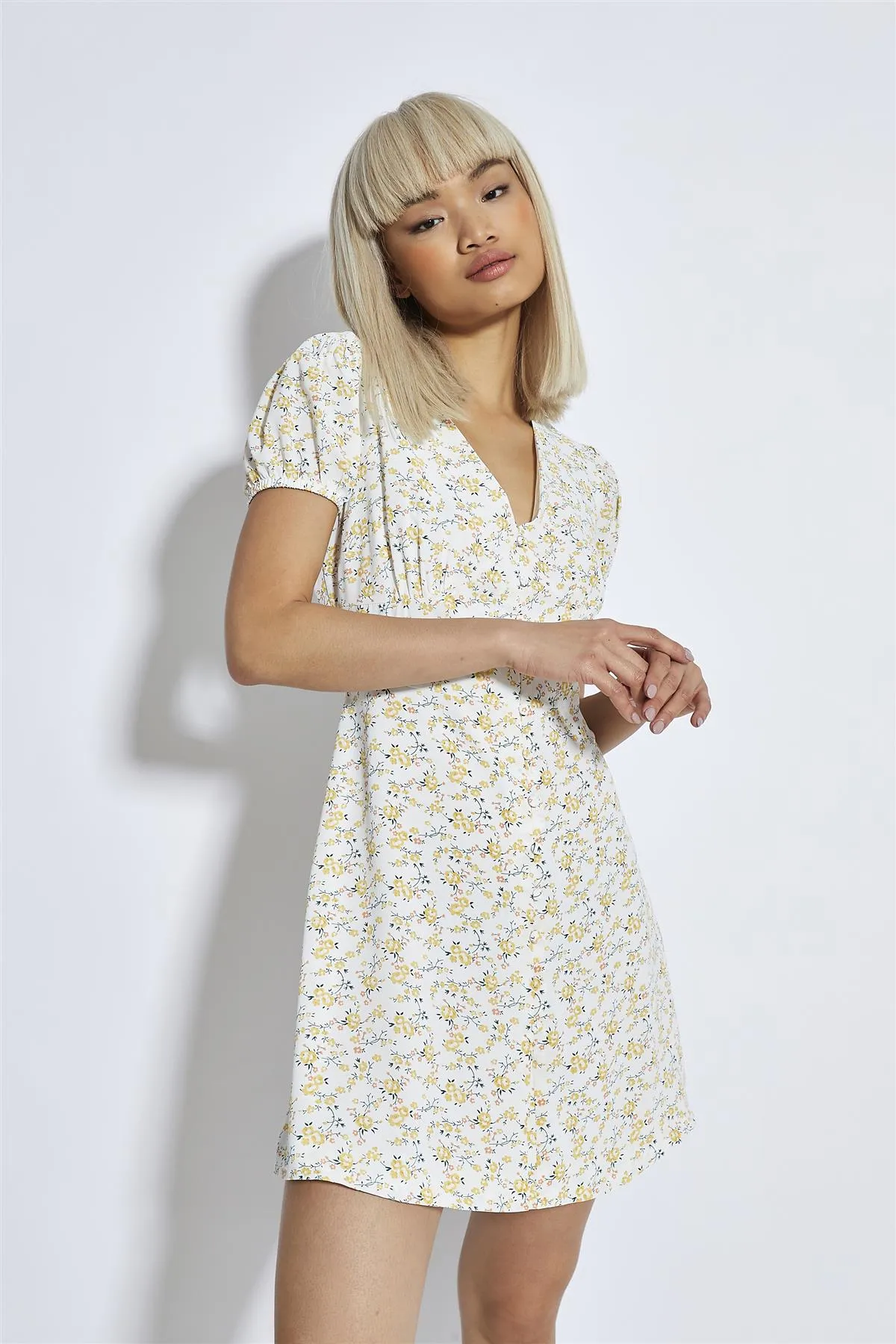 Yellow-Peach Ditsy V-Neck Mini-Dress sold by Glamorous