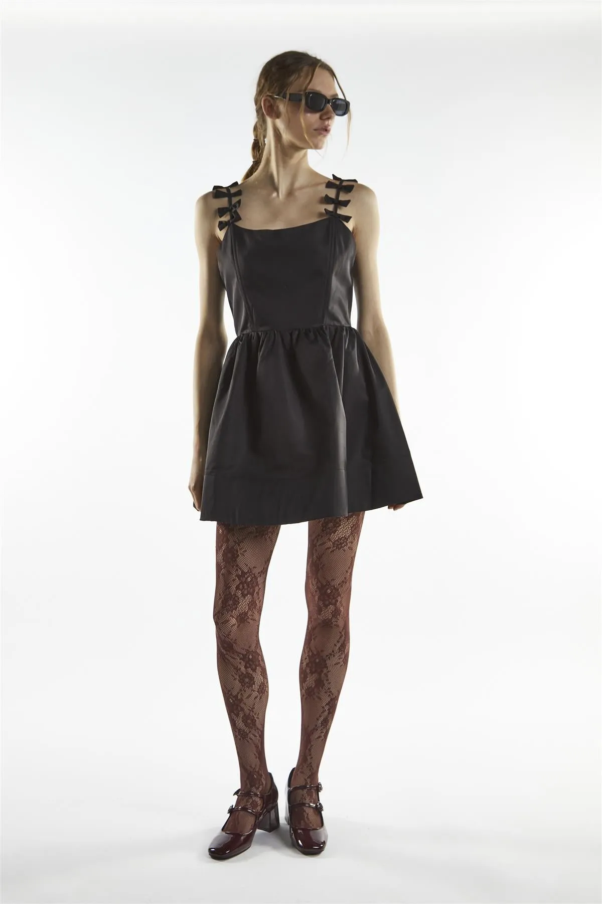 Bow Strap Mini Dress - Charli Black sold by Glamorous