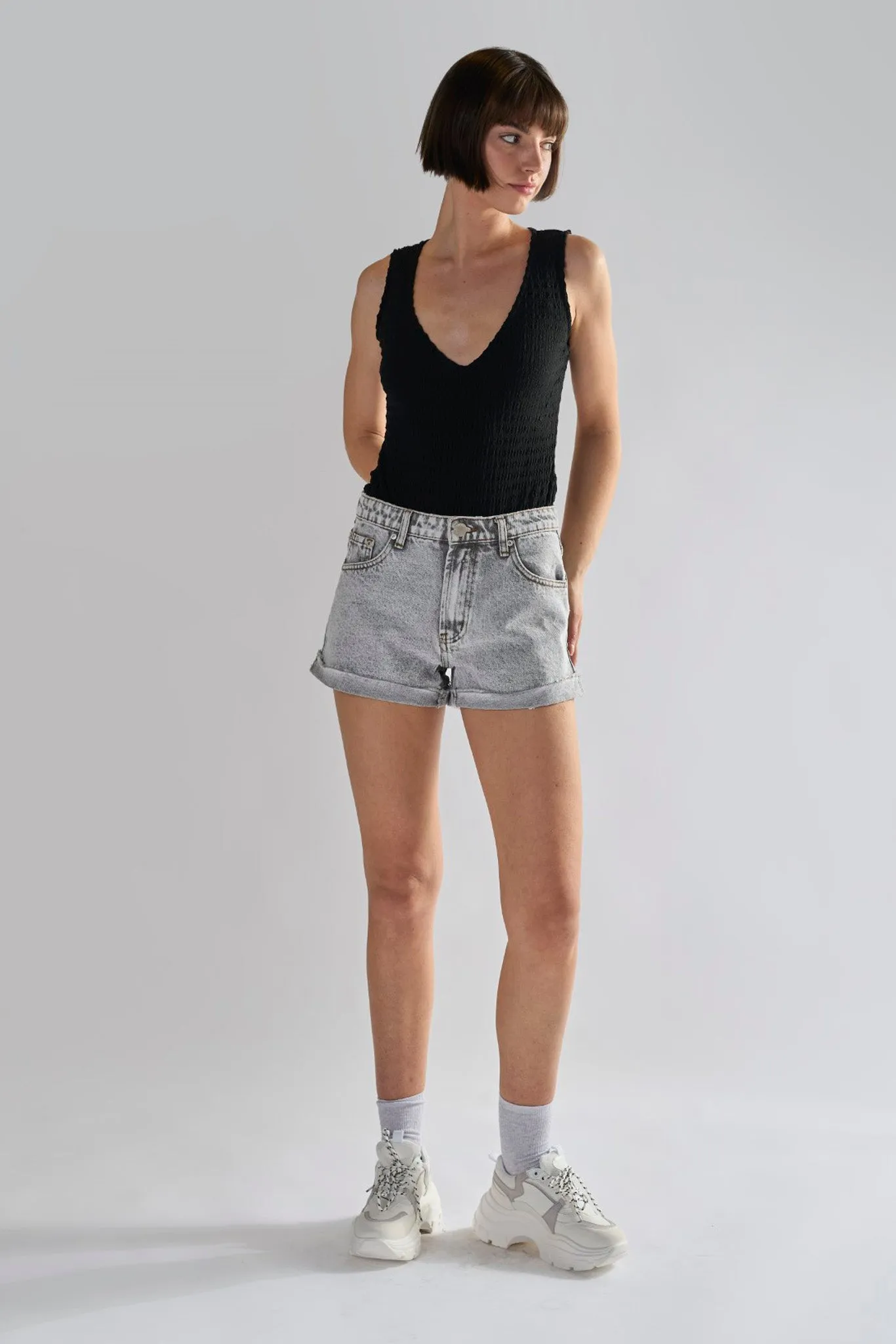 Bleach-Acid Black Denim Shorts sold by Glamorous