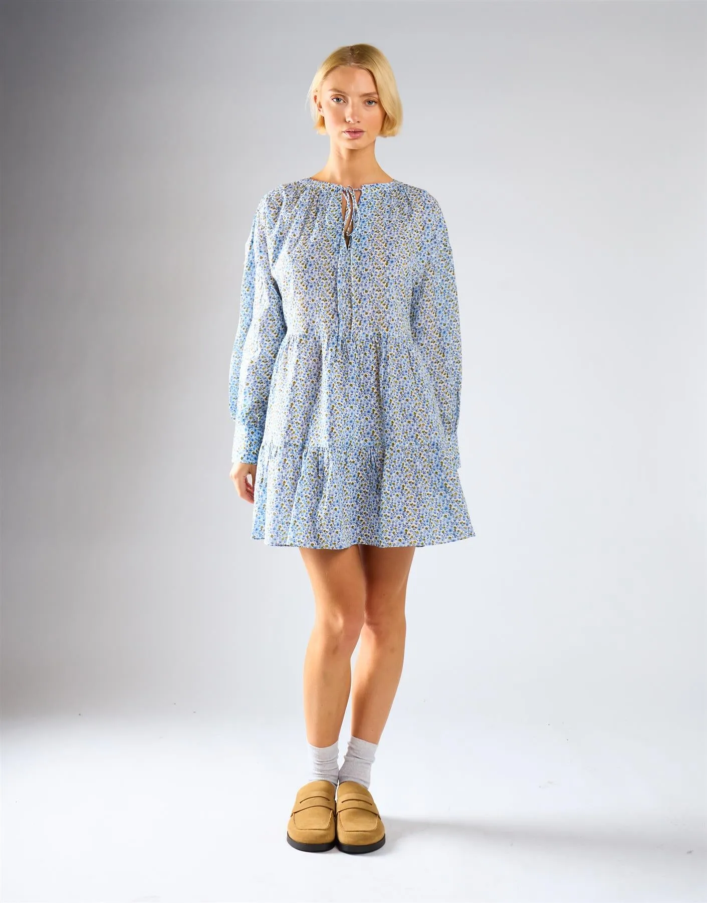 Blue Ditsy Floral Long Sleeve Frill Tiered Dress sold by Glamorous