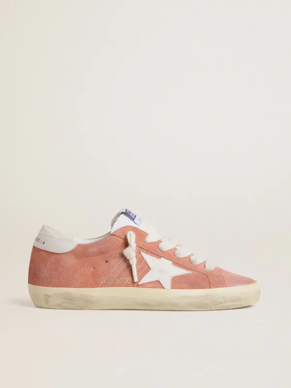 Women’s Super-Star in coral suede with white leather star and heel tab made by Golden Goose