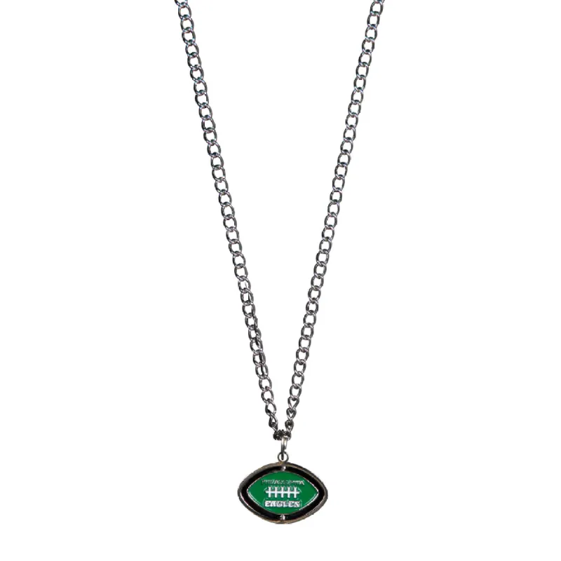 EAGLES SPINNING FOOTBALL NECKLACE by GOLF WANG sold by Golf Wang