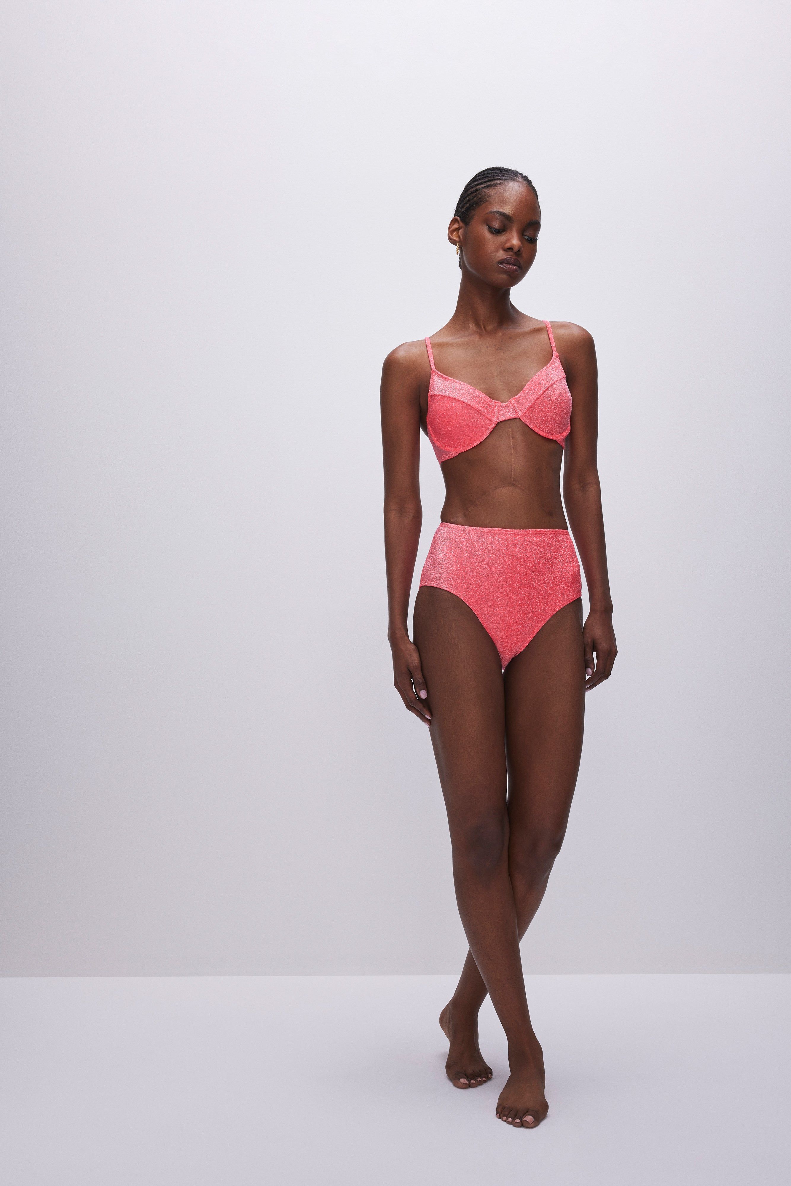 SPARKLE SWIM BRIEF | FIERY CORAL 002 sold by Good American