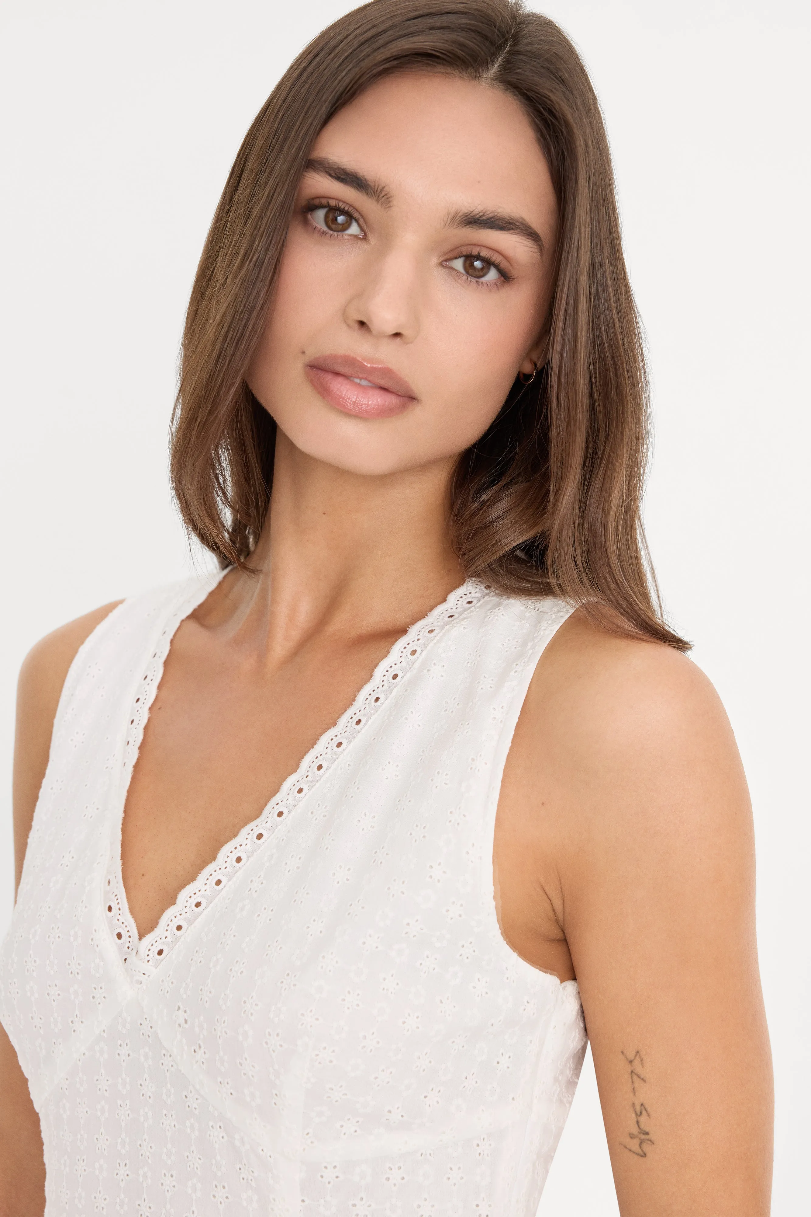 THE EYELET MINI DRESS | WHITE001 sold by Good American product image thumbnail 4