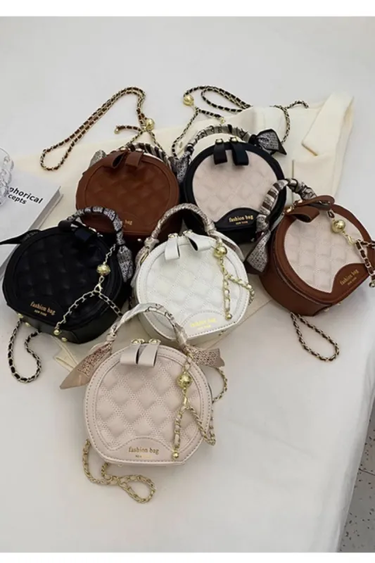 'Ivy' Top-Handle Mini Round Bag (6 color) sold by Goodnight Macaroon