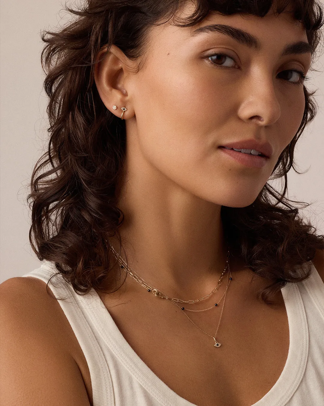 Diamond and Blue Sapphire Evil Eye Stud Huggies sold by Gorjana product image thumbnail 3