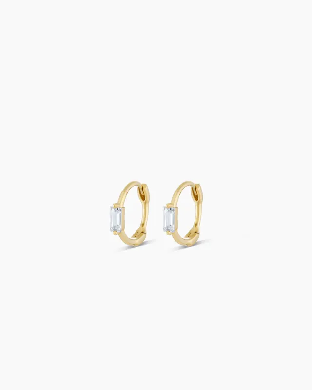 Solitaire Baguette White Sapphire Huggies sold by Gorjana