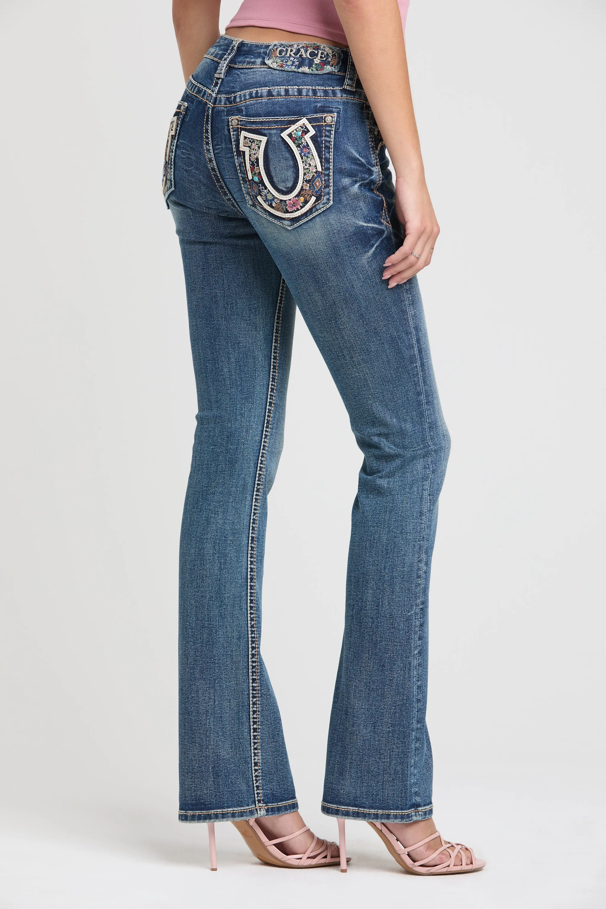Horse Shoe/Floral Embroidery Mid Rise Bootcut Embroidered Jeans sold by Grace in LA