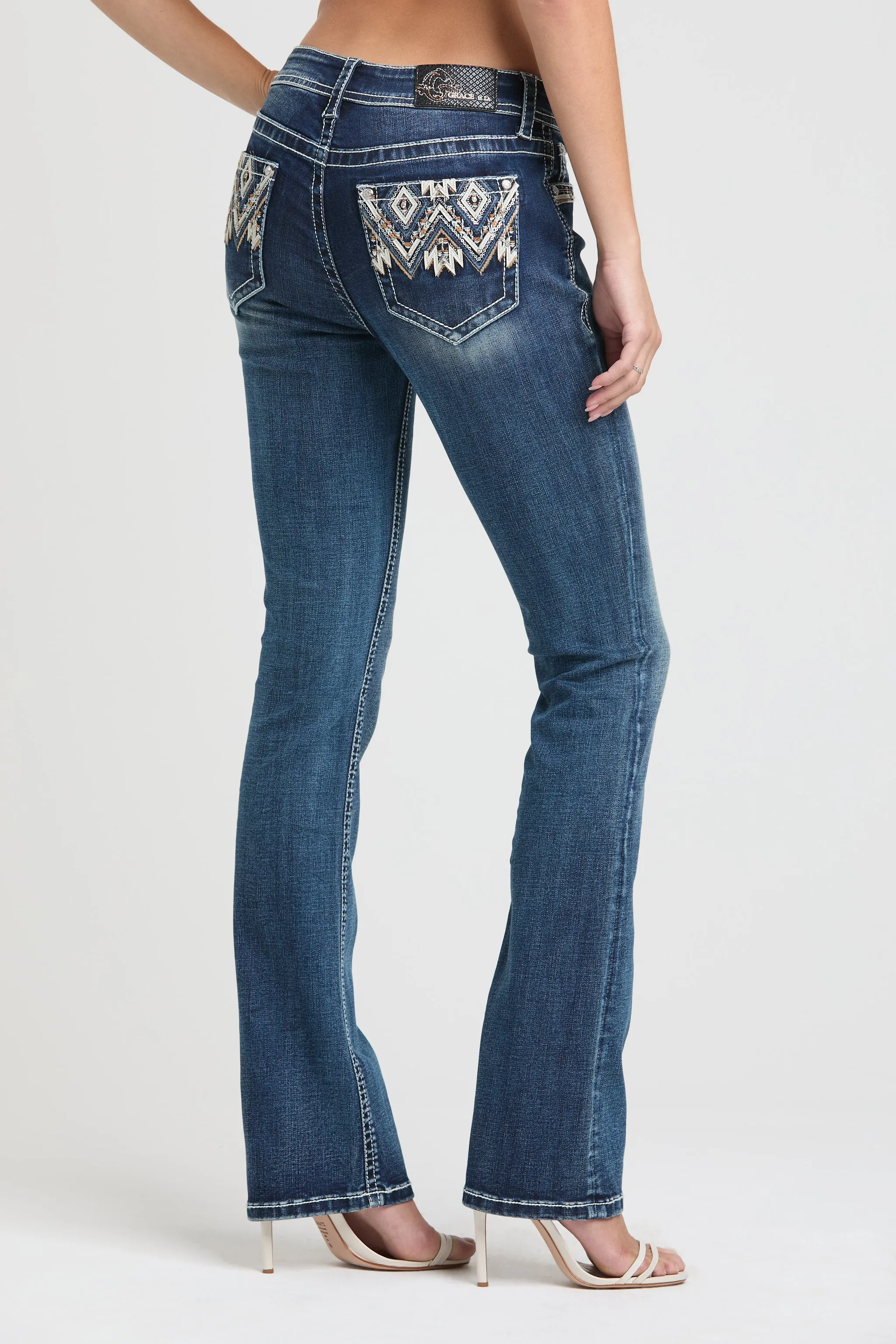 Aztec Embroidery Mid Rise Bootcut Jeans sold by Grace in LA