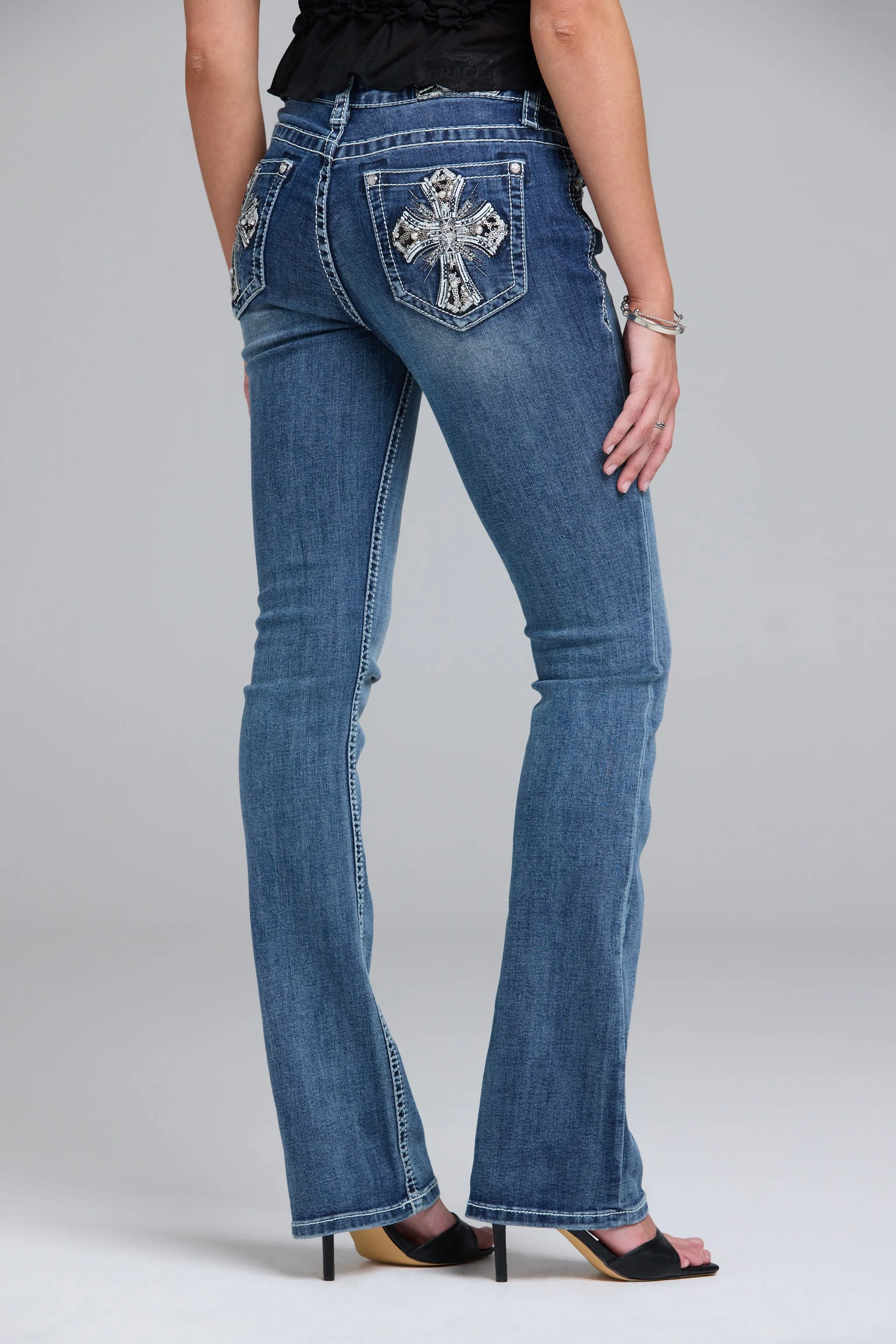 Cross Embroidered Bootcut Jeans sold by Grace in LA