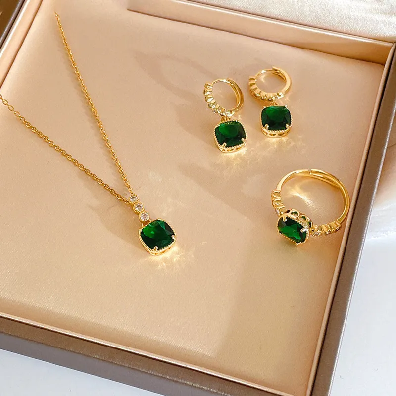 Vintage emerald earrings ring necklace set sold by Grace Karin
