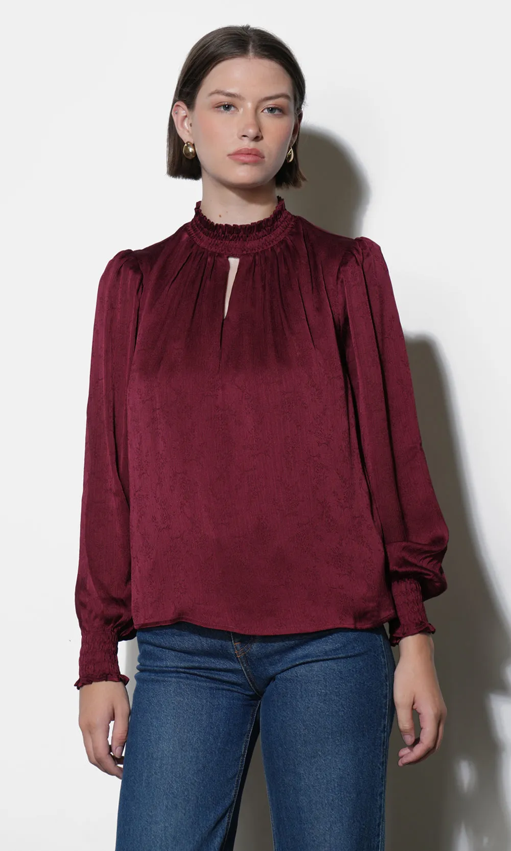 Mika Textured Smocked Neck Blouse sold by Greylin