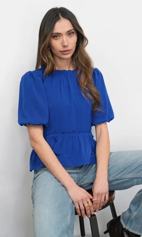 Lou Peplum Top sold by Greylin