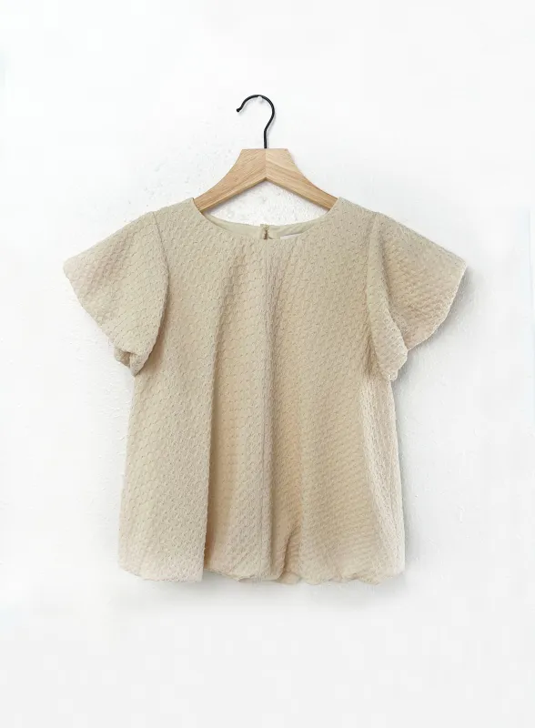Gio Knit Puff Sleeve Bubble Top sold by Greylin